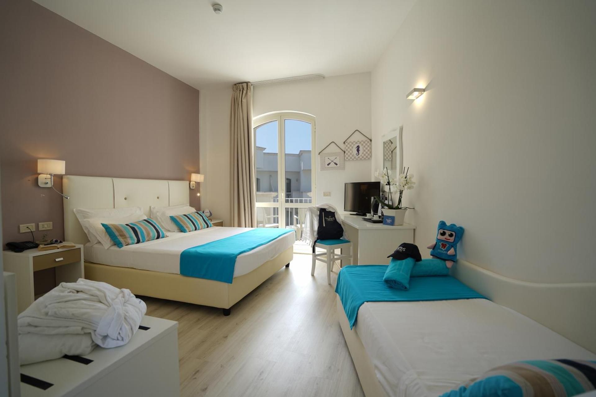 Quadruple Room with Balcony