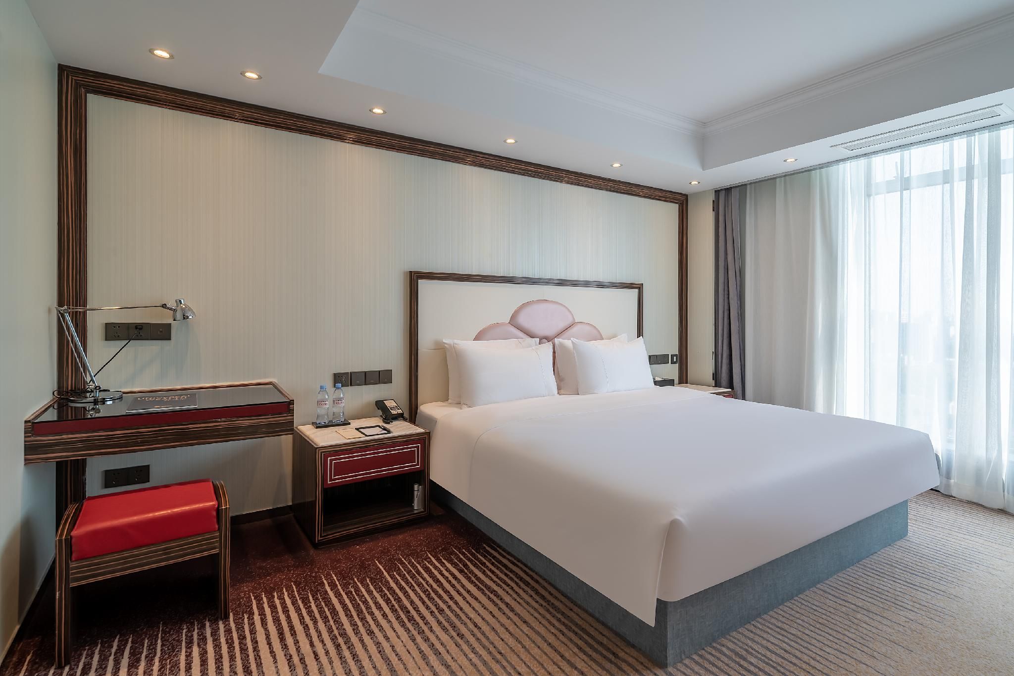 Centara 2-Bedroom with 1 King Bed and 2 Single Beds