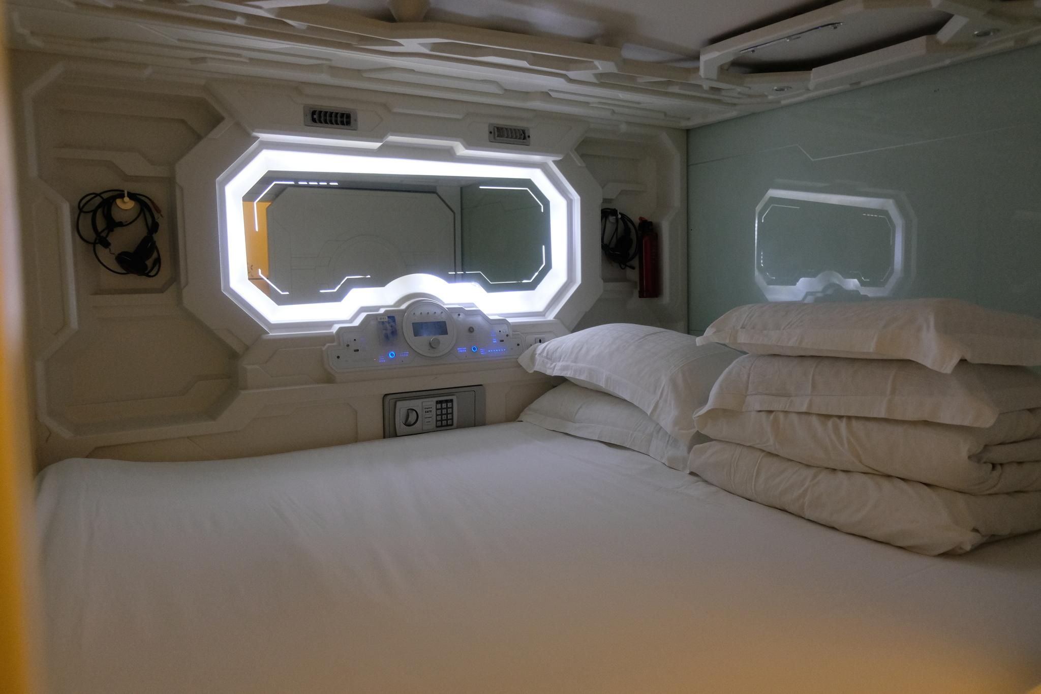 Queen Capsule with Shared Bathroom