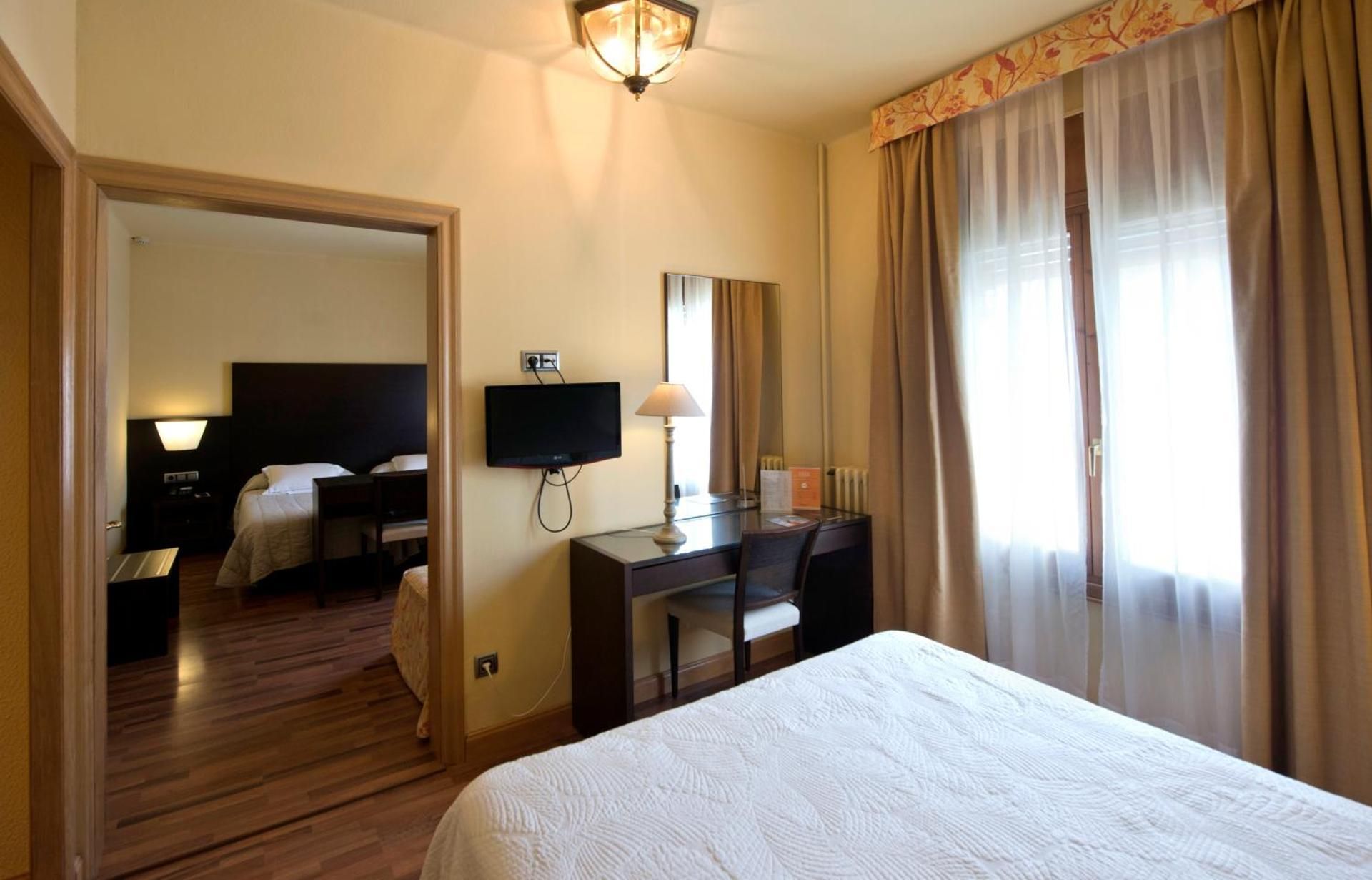 Quadruple Room (2 Adults + 2 Children)