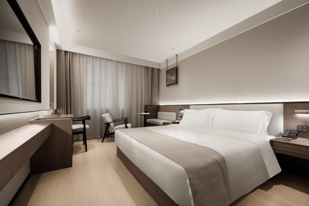 Elegant City View Queen Bedroom