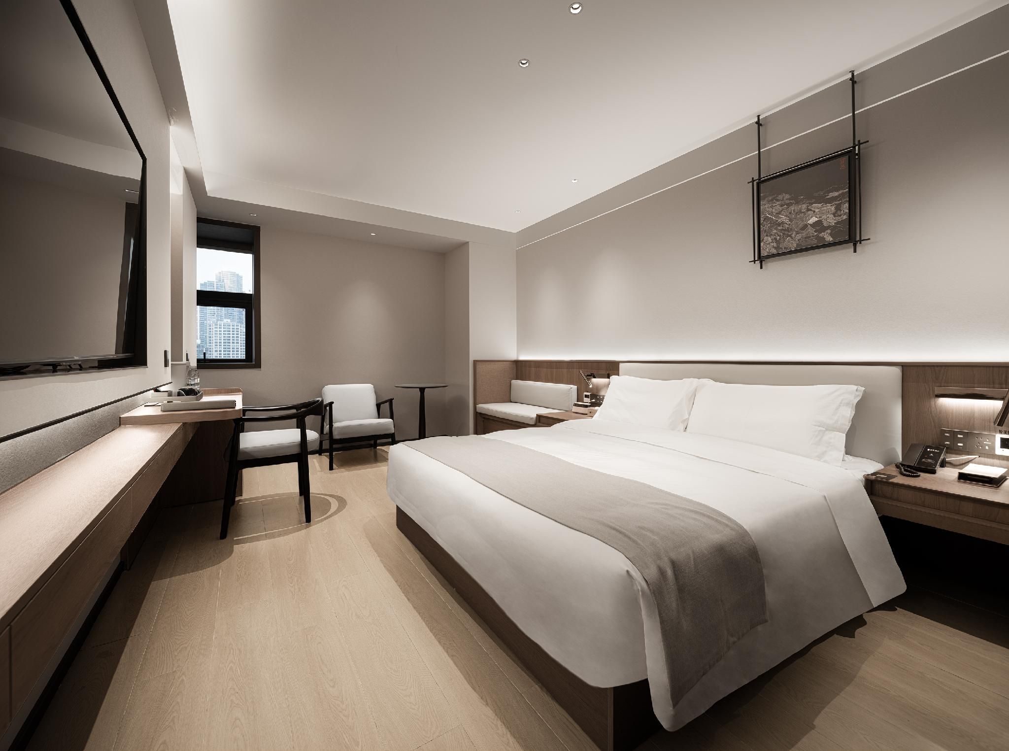 Elegant City View Queen Bedroom