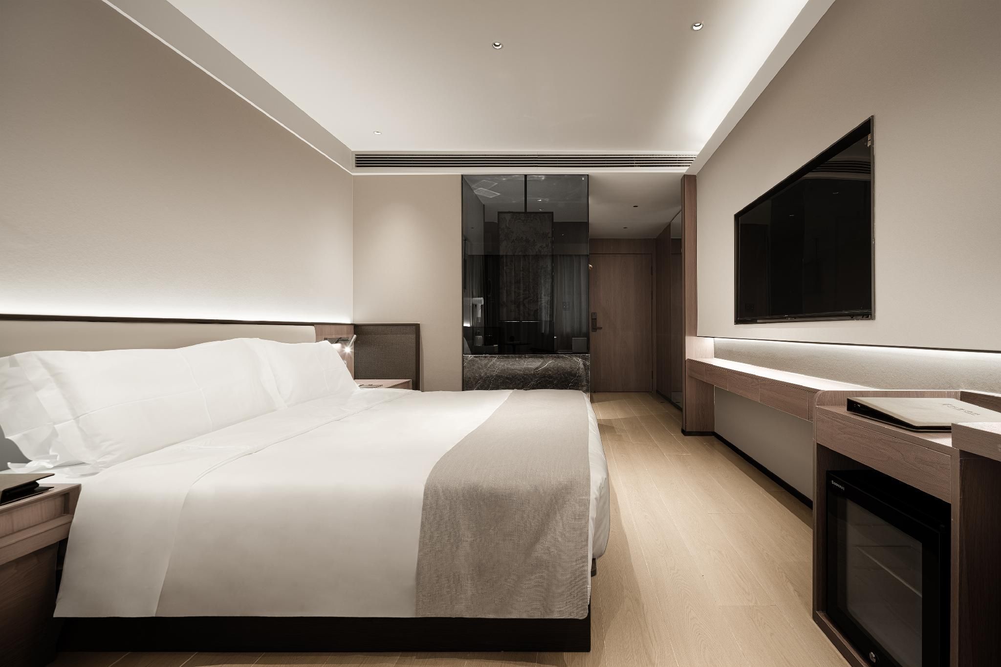 Elegant City View Queen Bedroom
