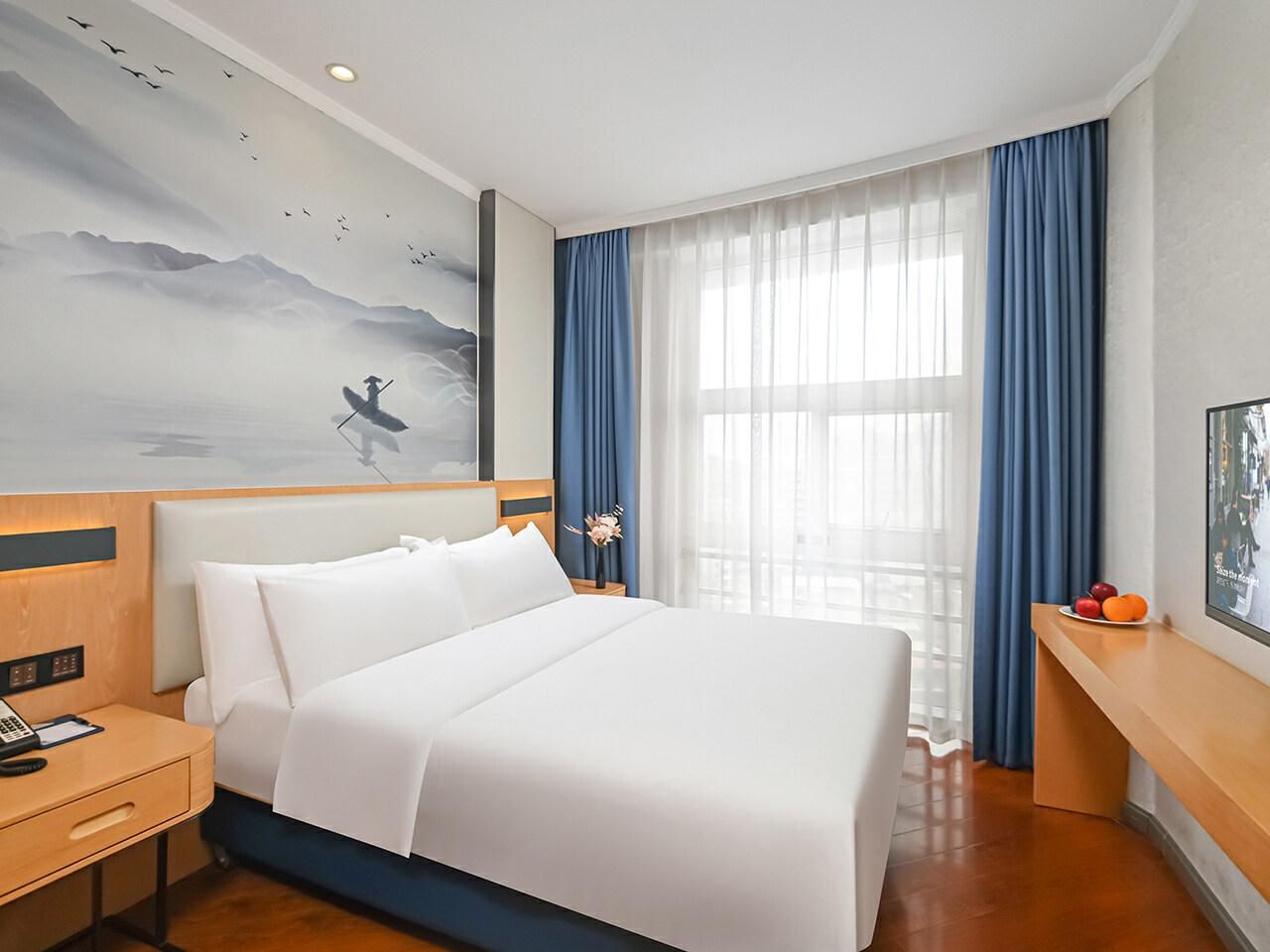 Kyriad Marvelous Hotel Guangzhou Panyu Olympic Park Plaza WH -Light Enjoyment Bed Room