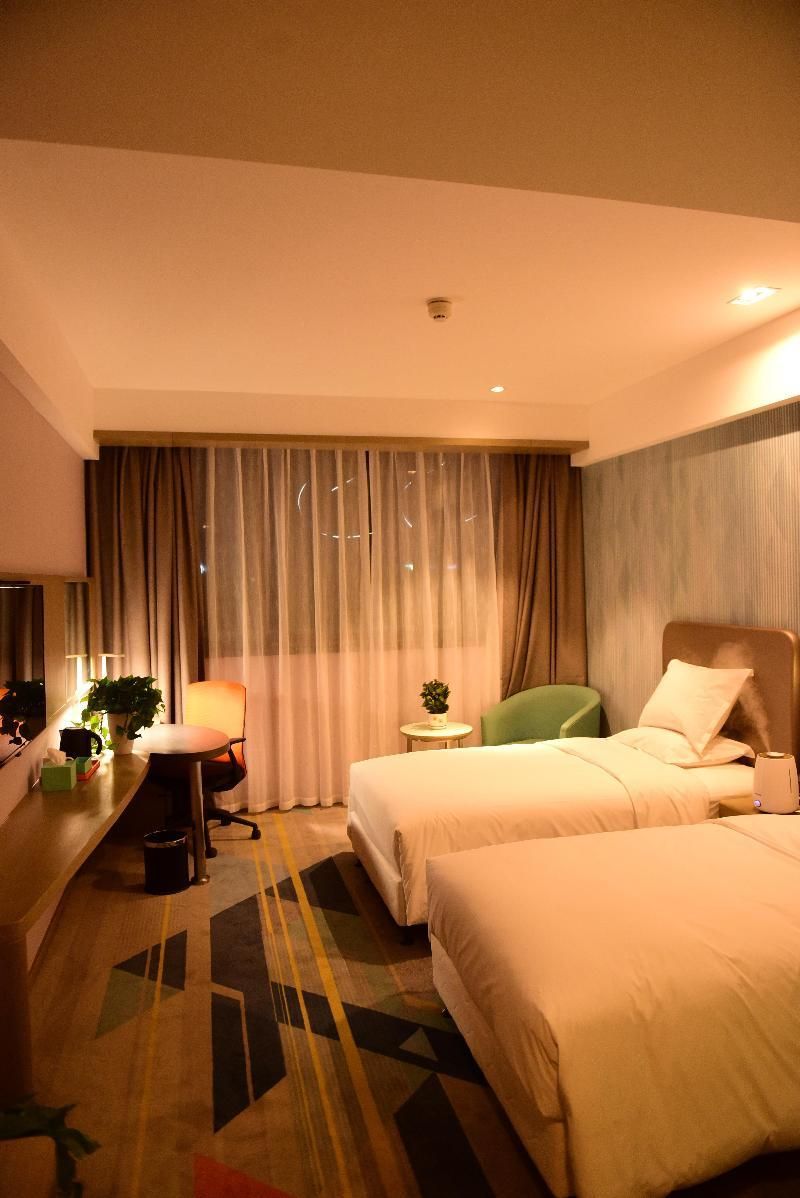 2 Single Beds Standard Extra Floor Space