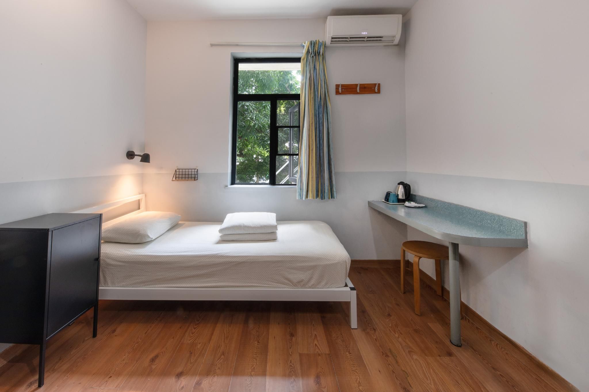 Twin Room with 2 Single Beds and Shared Bathroom