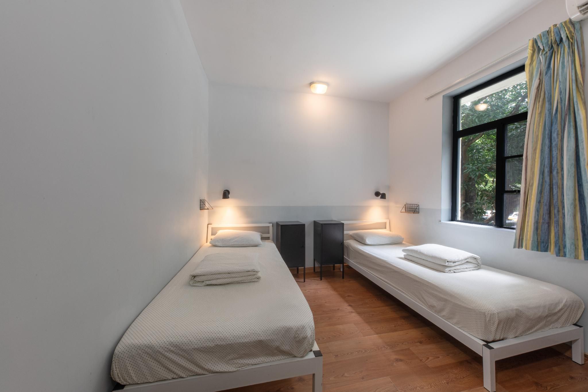 Twin Room with 2 Single Beds and Shared Bathroom