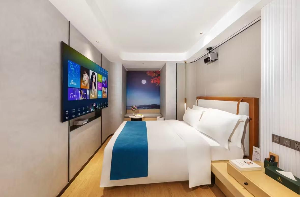 Elong Xicheng International Hotel(Haiya Binfeng Cheng Tongle South Metro Station) Movie Room with TV