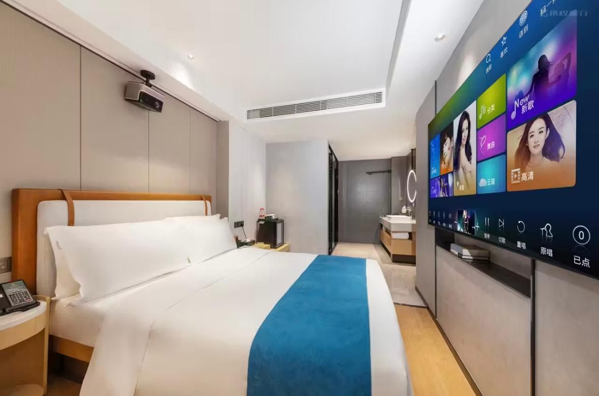 Elong Xicheng International Hotel(Haiya Binfeng Cheng Tongle South Metro Station) Movie Room with TV 2