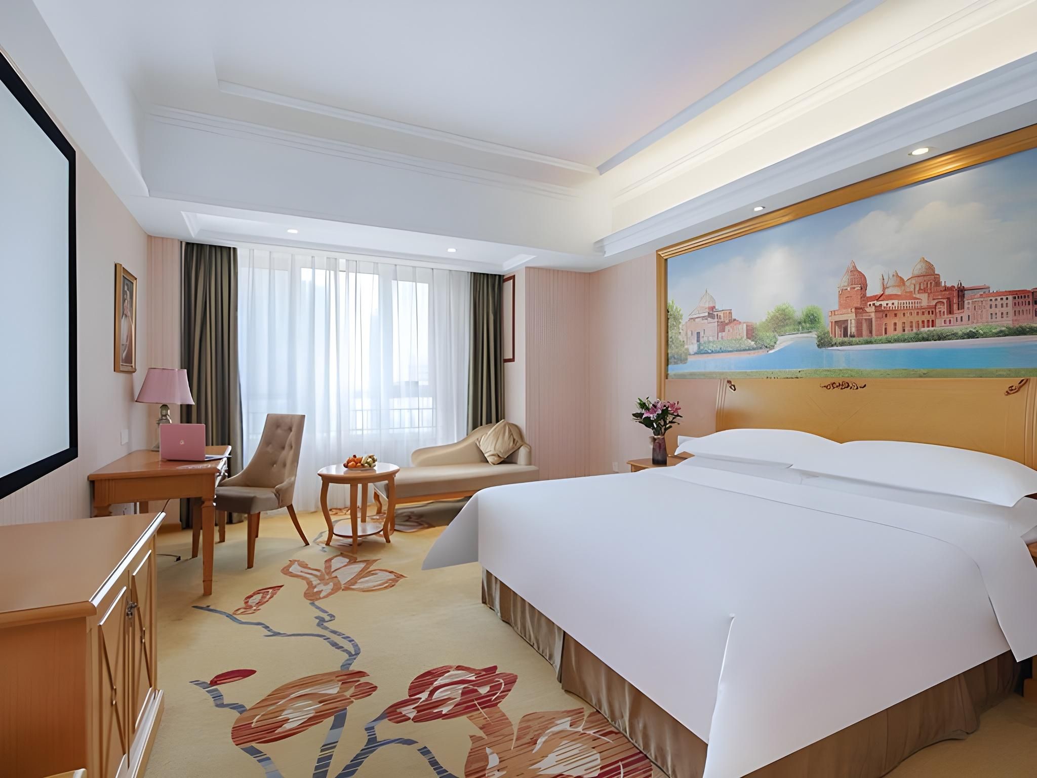 Vienna Hotel Qingdao Chengyang Wanxianghui Vienna - Cinema Bed Room