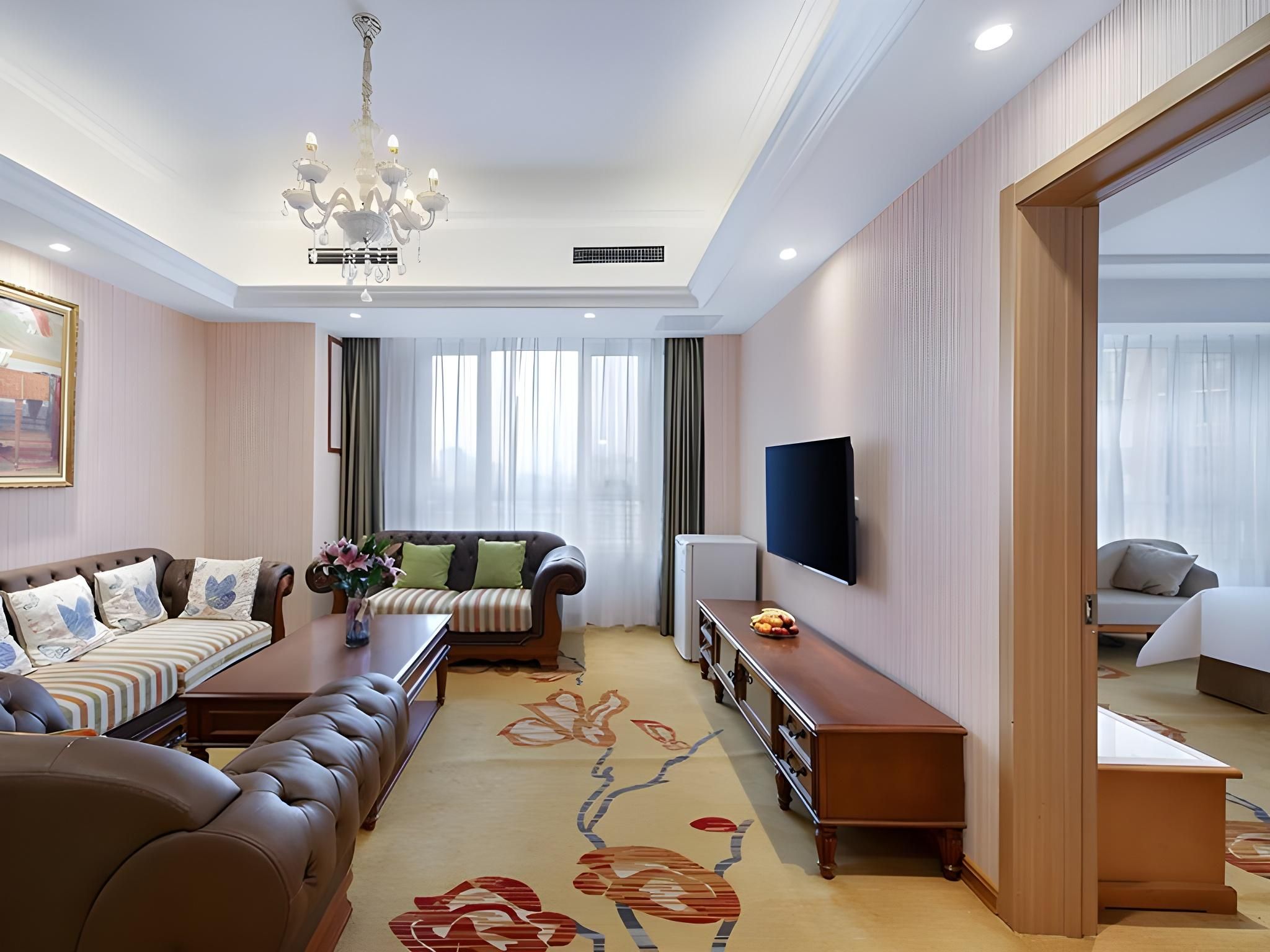 Vienna Hotel Qingdao Chengyang Wanxianghui Business Suite