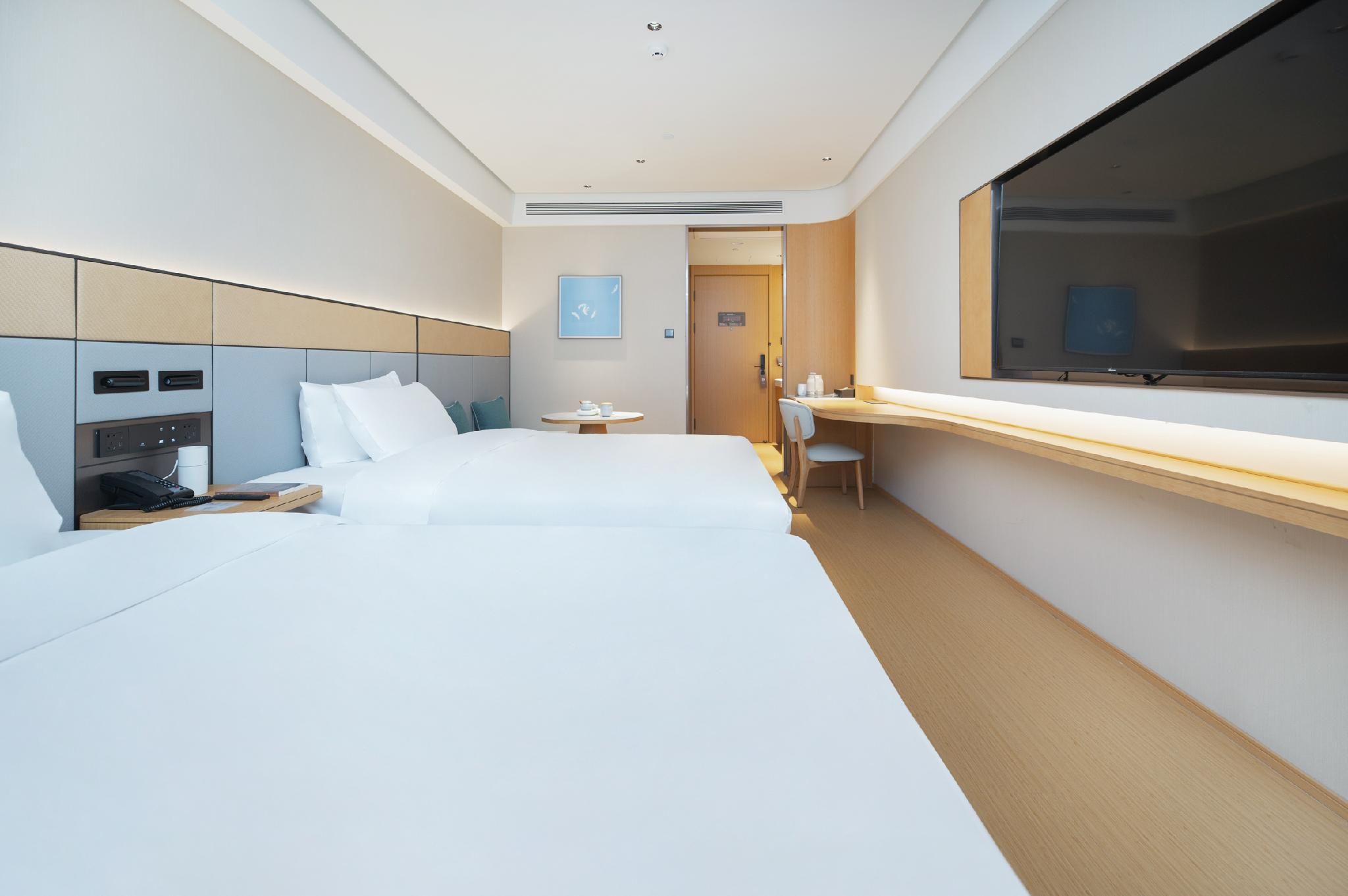 Ji Hotel Qingdao Laoshan MixC Huazhu - Family Room