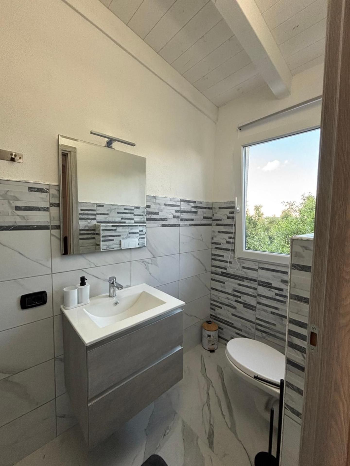 Quadruple Room with Private Bathroom