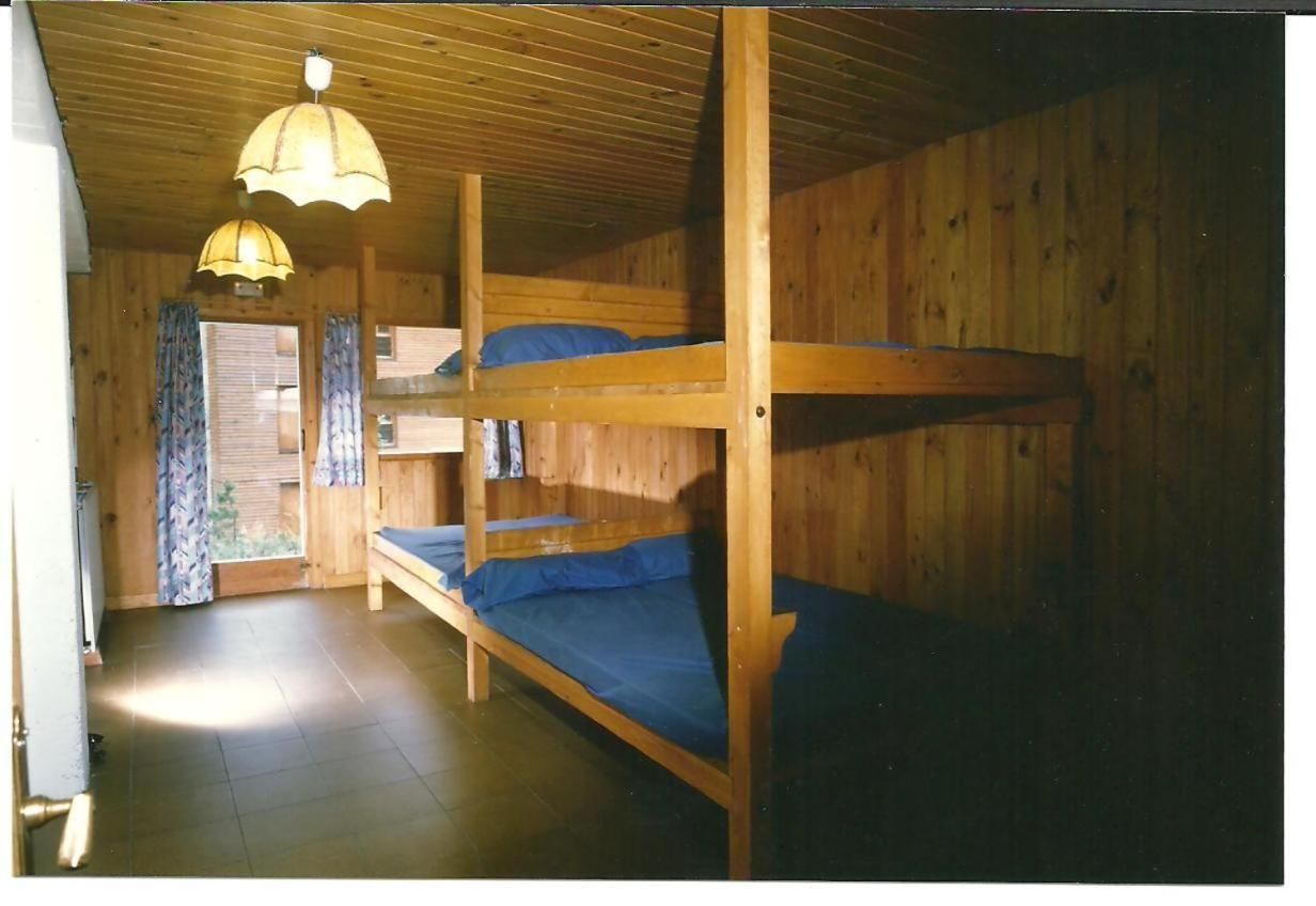 Single Bed in Dormitory Room
