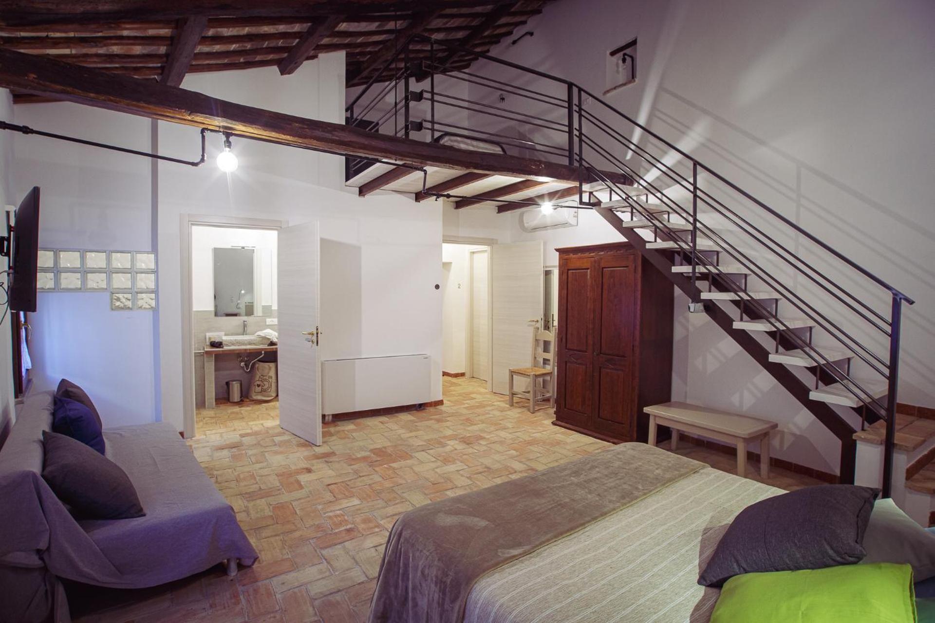 Quadruple Room with Private Bathroom