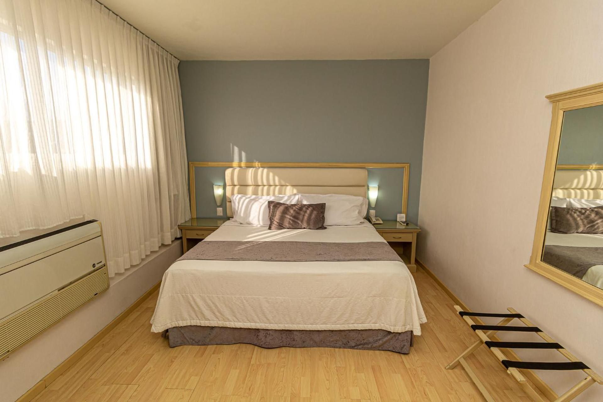 Hoteles Piedra Alta by De Los Perez Standard King Room 2