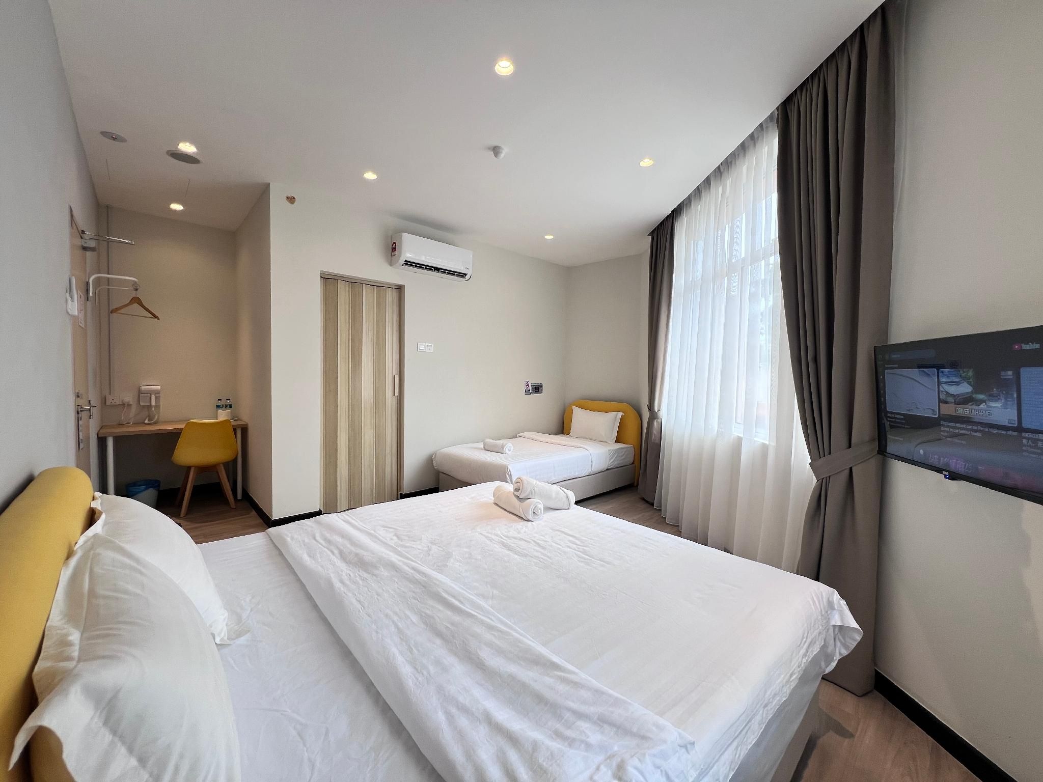 Triple Room - 1 King Bed and 1 Single Bed