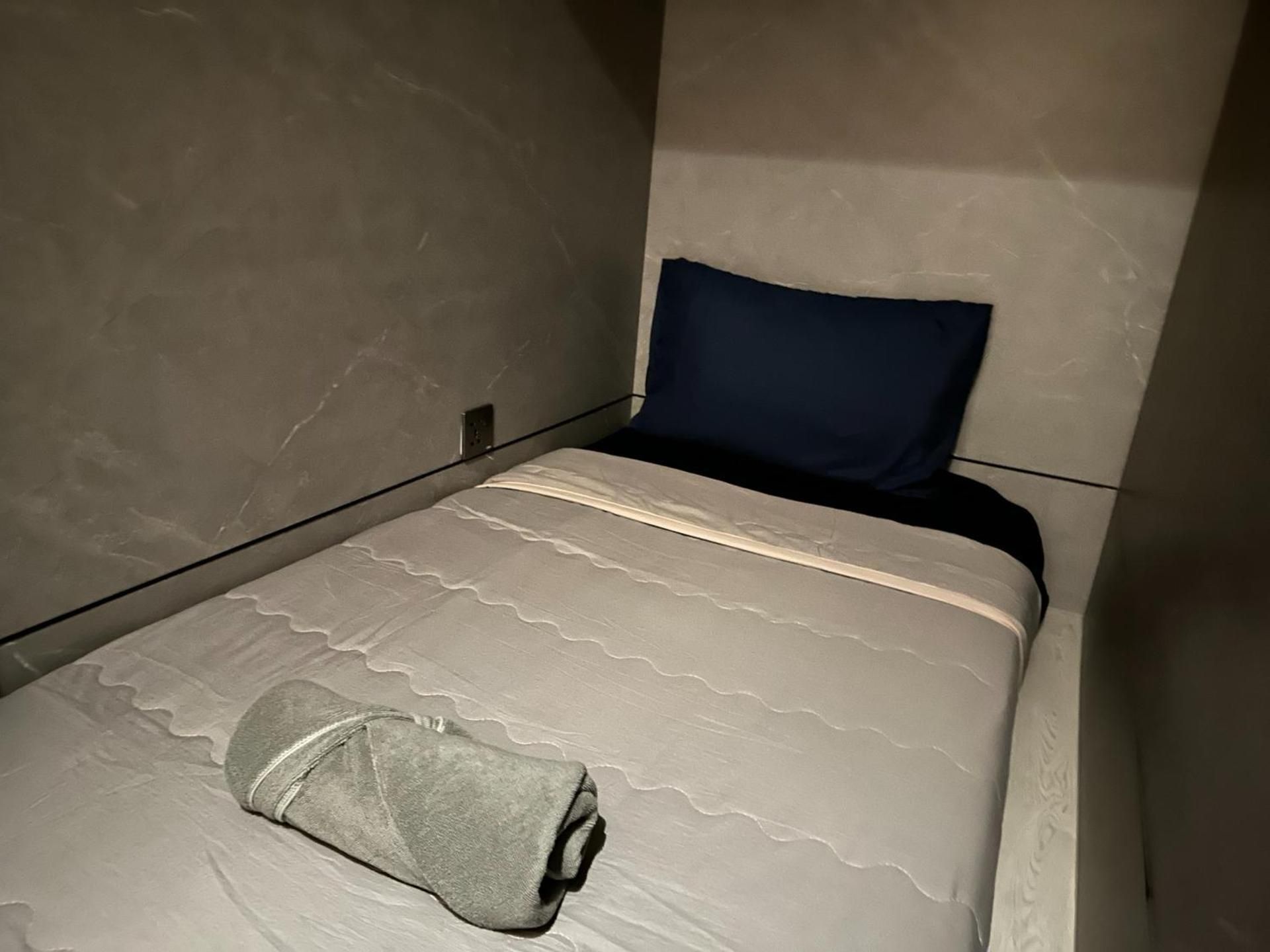Single Bed in Dormitory Room
