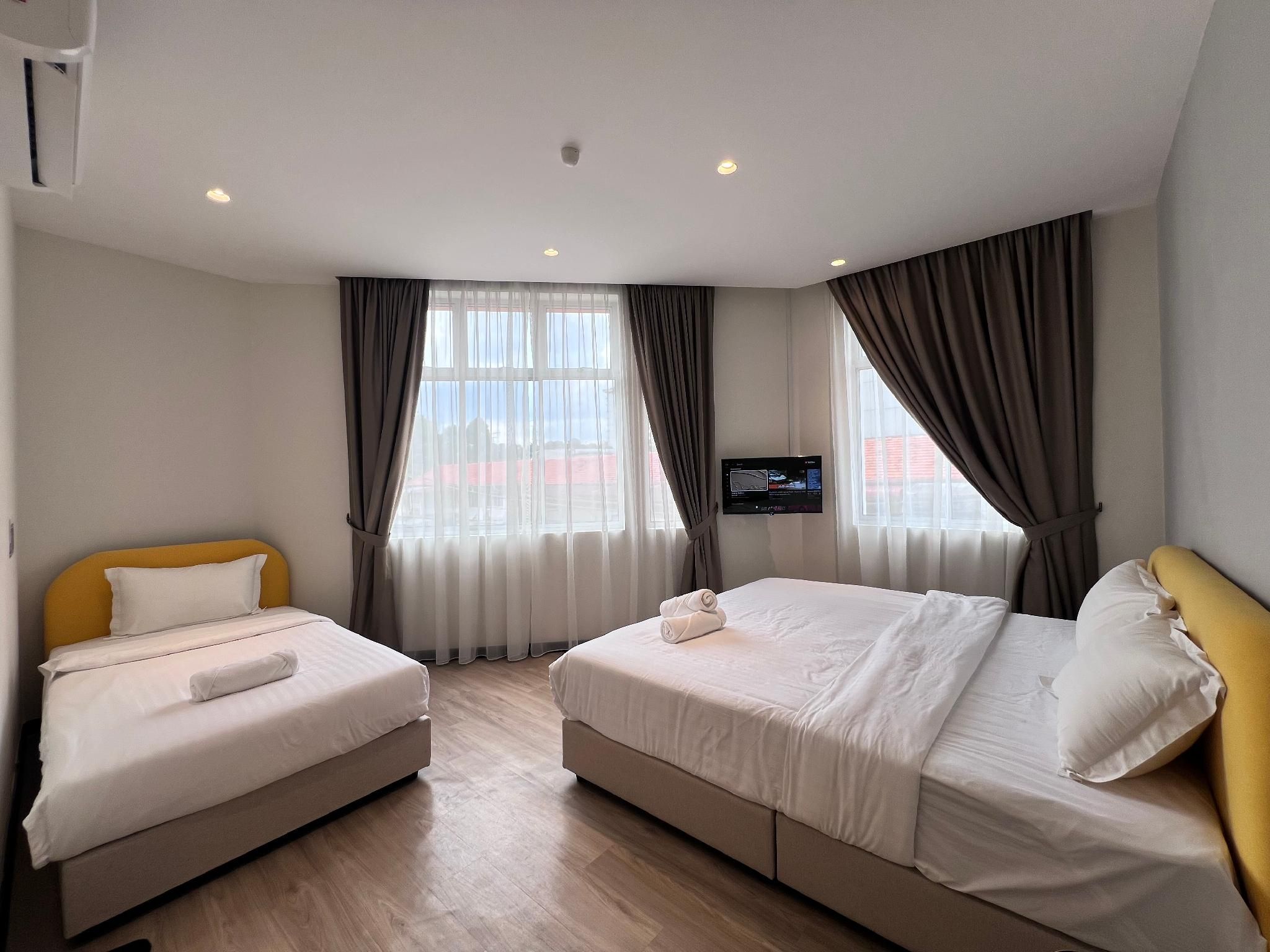 Triple Room - 1 King Bed and 1 Single Bed