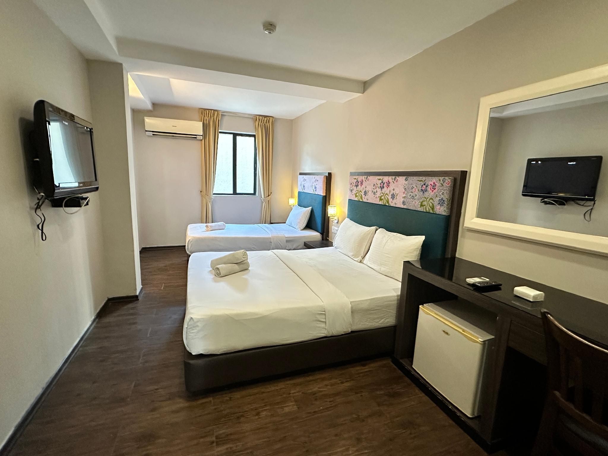 Family Room - (1 Double Bed 1 Single Bed)