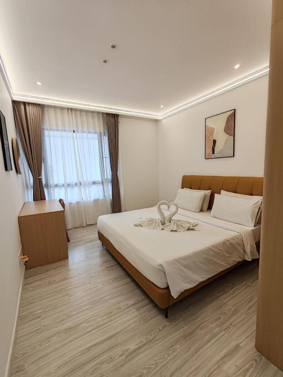 One-Bedroom Apartment with Balcony and City View