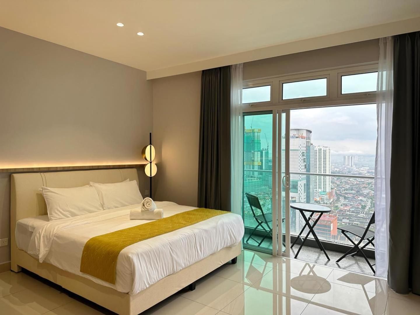 One-Bedroom Apartment with Balcony and City View