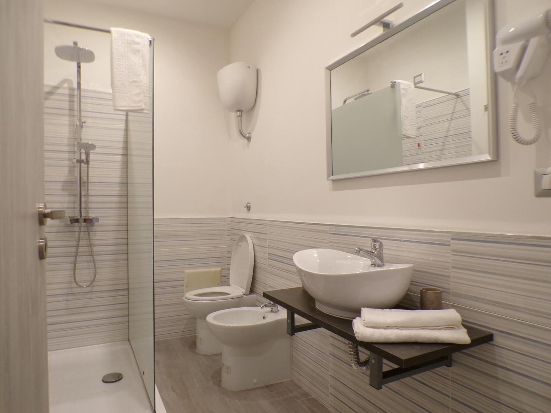 Quadruple Room with Private Bathroom