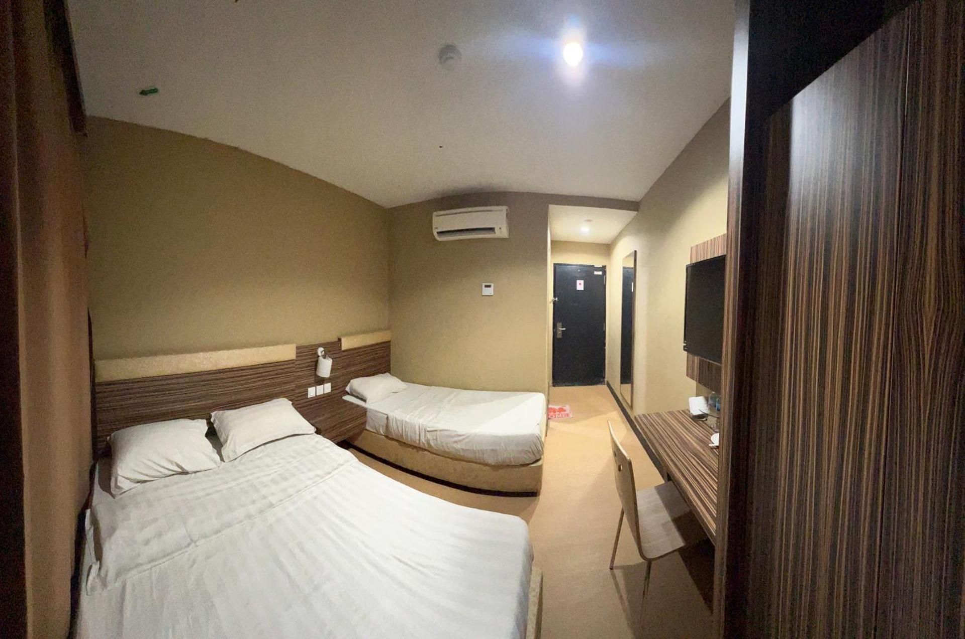 Triple Room - 1 Double Bed and 1 Single Bed