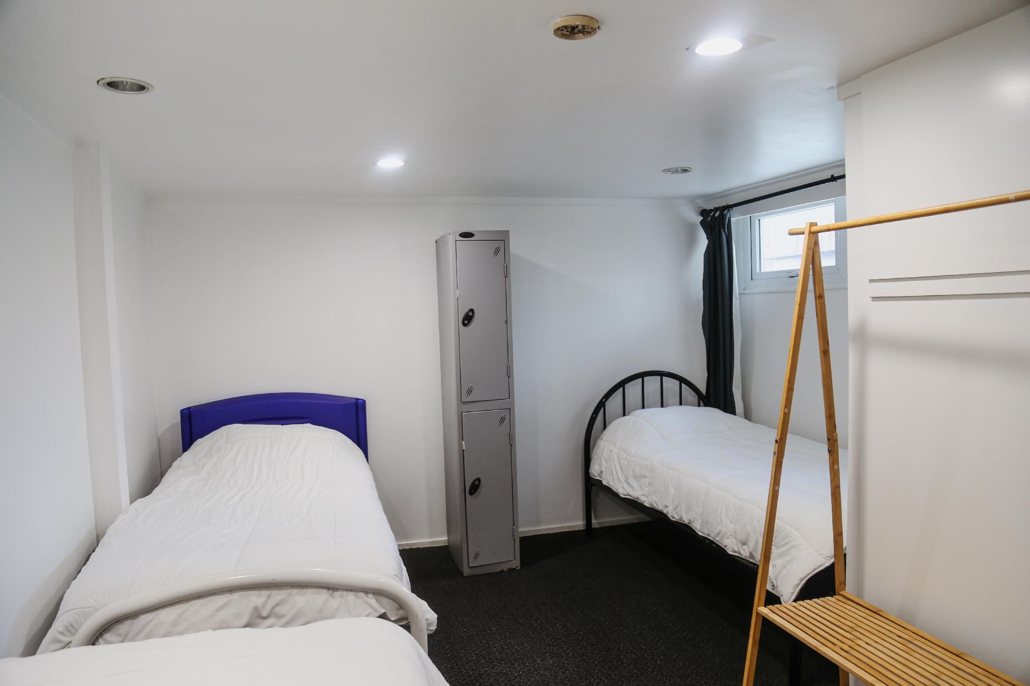 Shared Room with 3 Single Beds