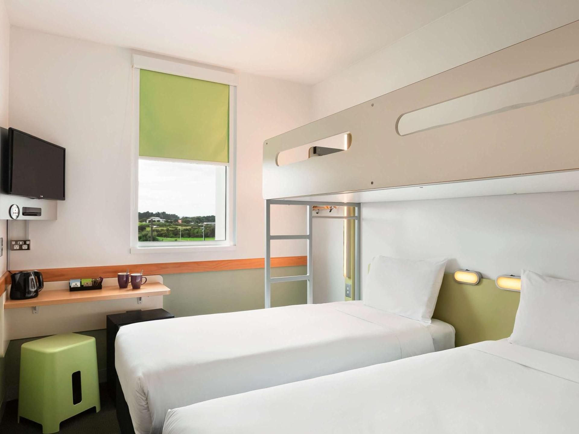 Standard Room, 1 King Bed and Overhead Bunk Bed or Two Single Beds and Overhead Bunk Bed