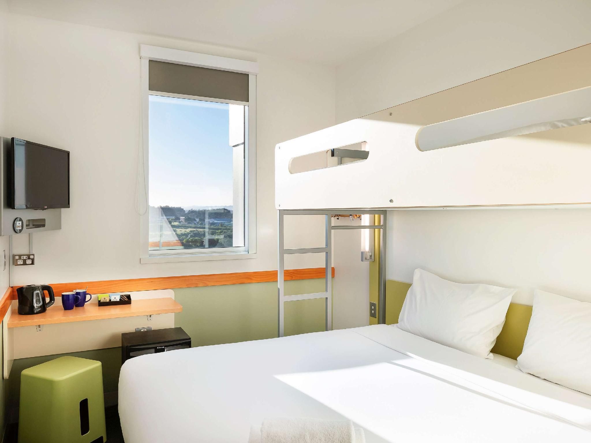 Standard Room, 1 King Bed and Overhead Bunk Bed or Two Single Beds and Overhead Bunk Bed