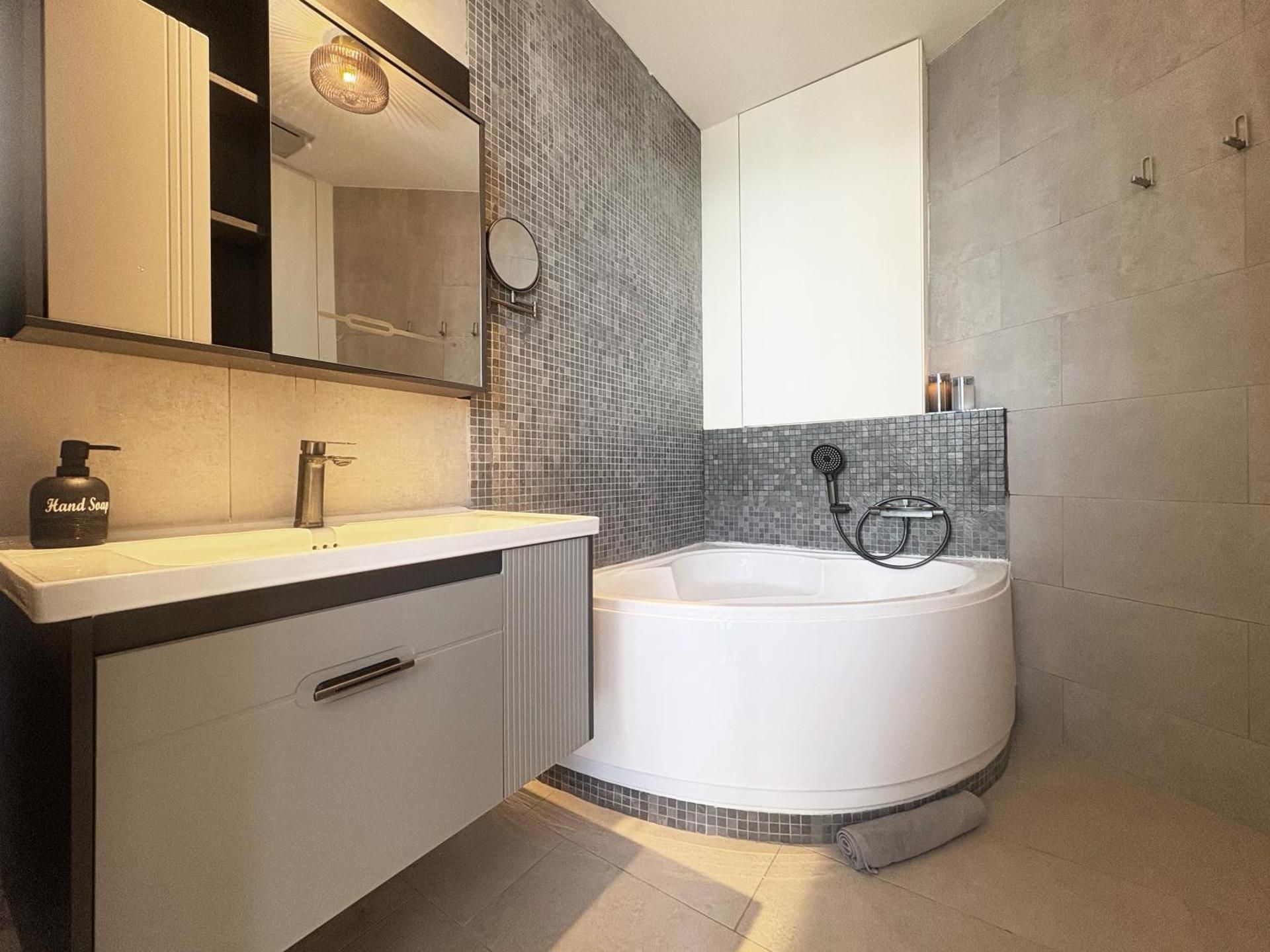 One-Bedroom Apartment with Balcony and Sea View