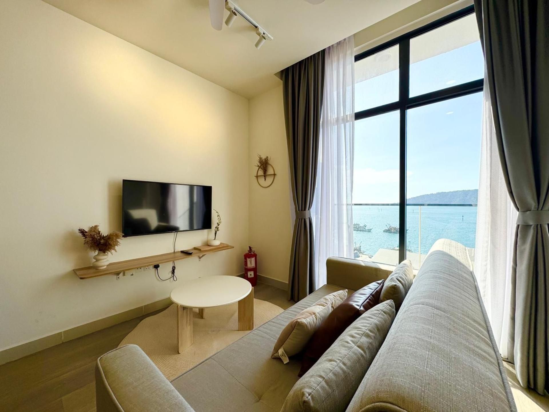 One-Bedroom Apartment with Balcony and Sea View