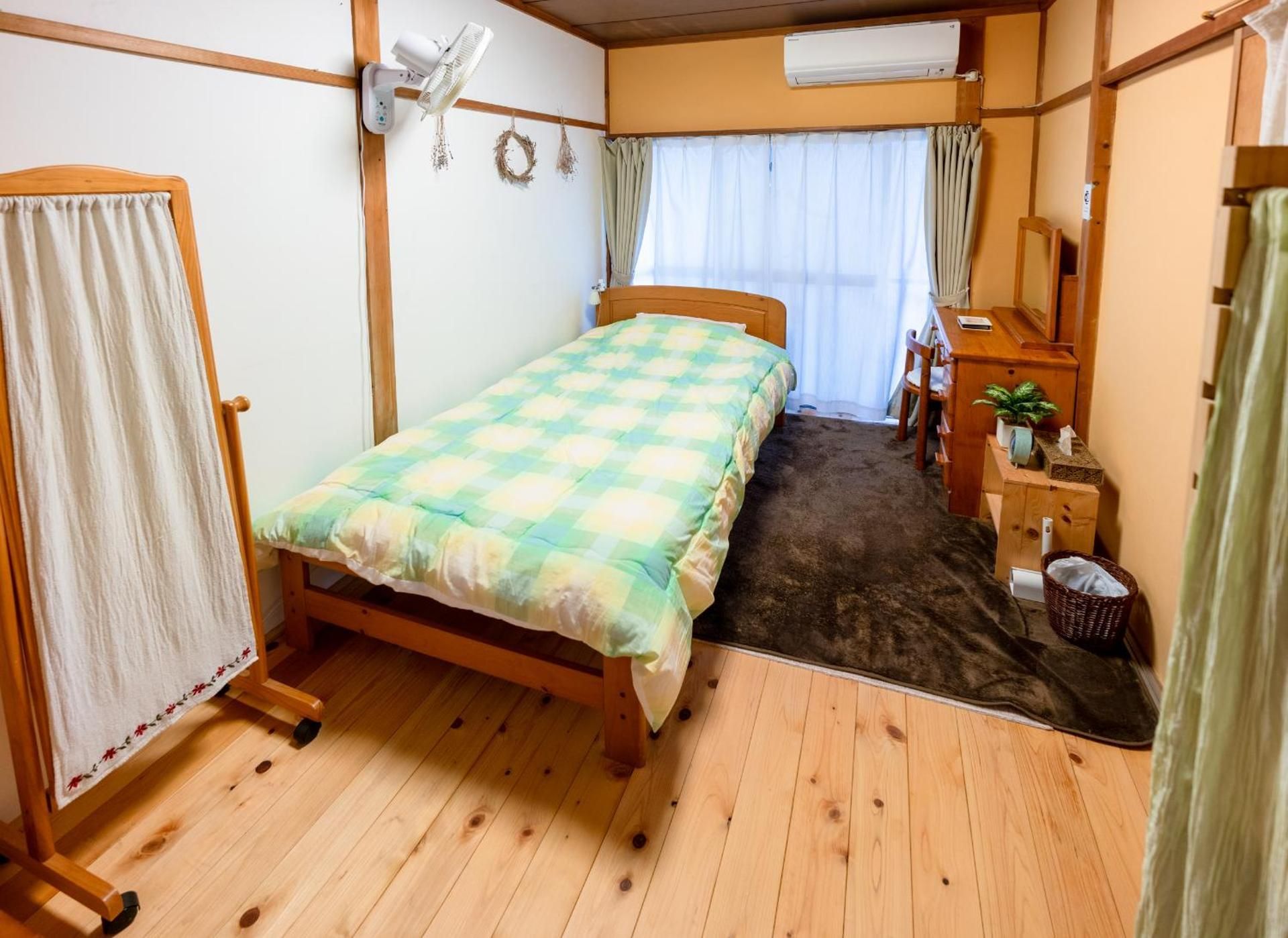Single Room with Shared Shower and Toilet