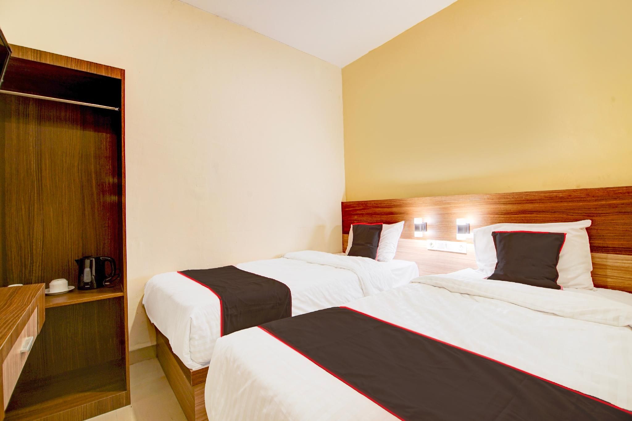 Capital O Pusat Kota Pekanbaru Near Mall Living World Formerly Radja Homestay Deluxe Twin