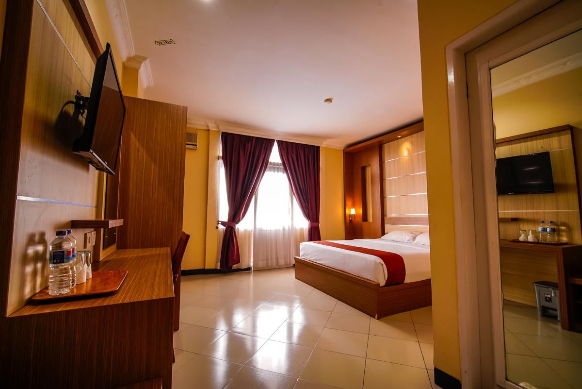 Kharisma Hotel Deluxe Room
