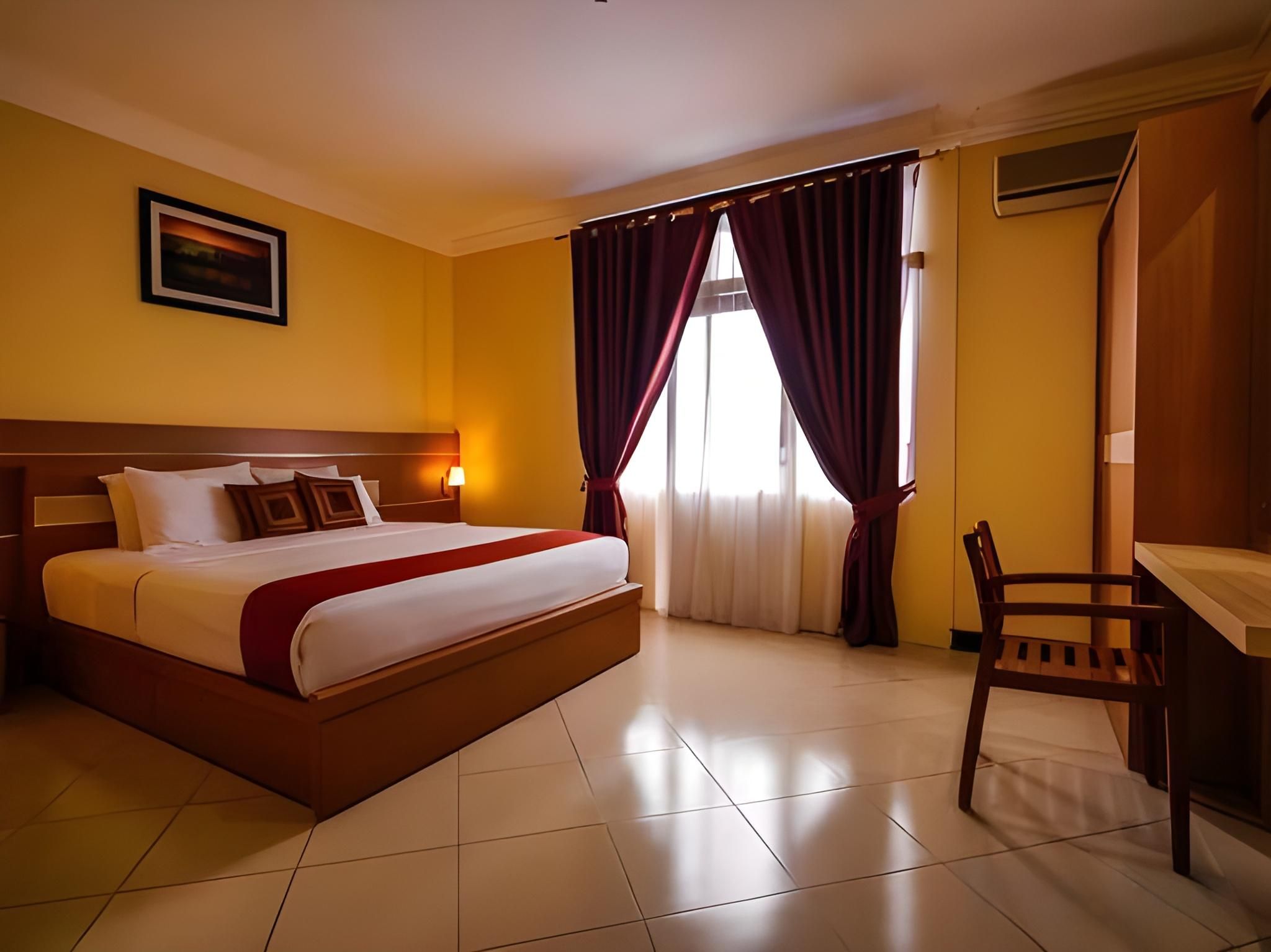 Kharisma Hotel Deluxe Room 2