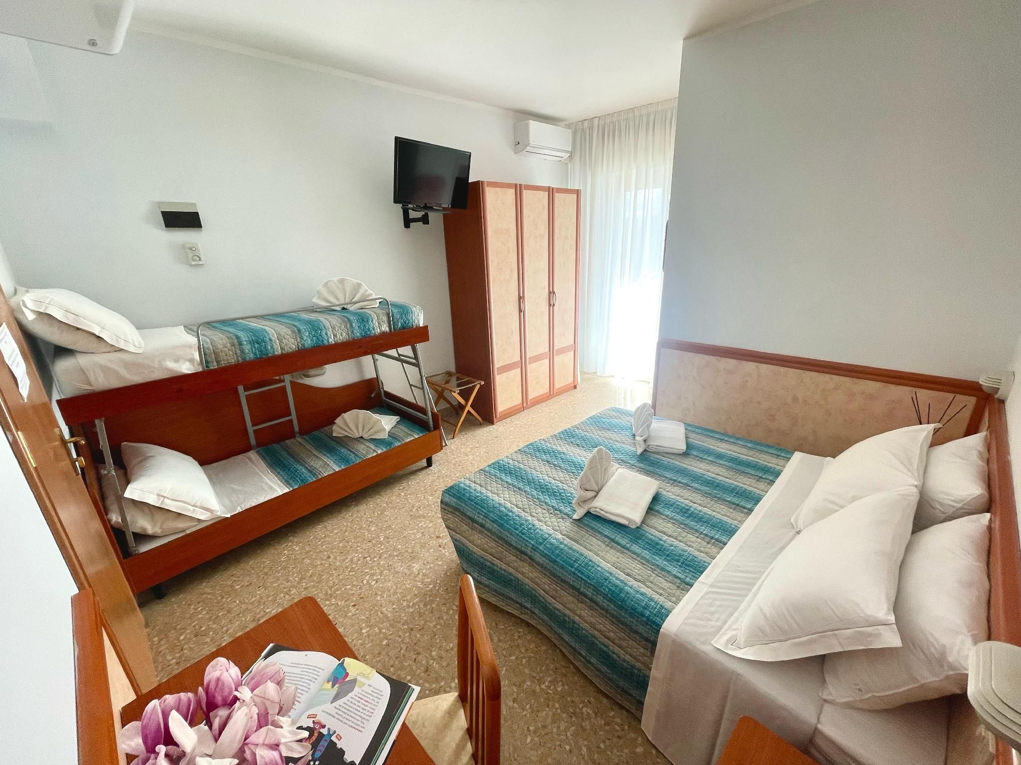Quadruple Room with Balcony