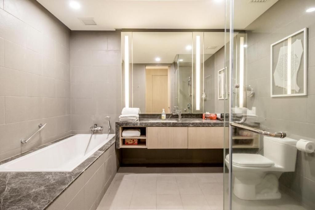 One-Bedroom Apartment with Balcony and City View