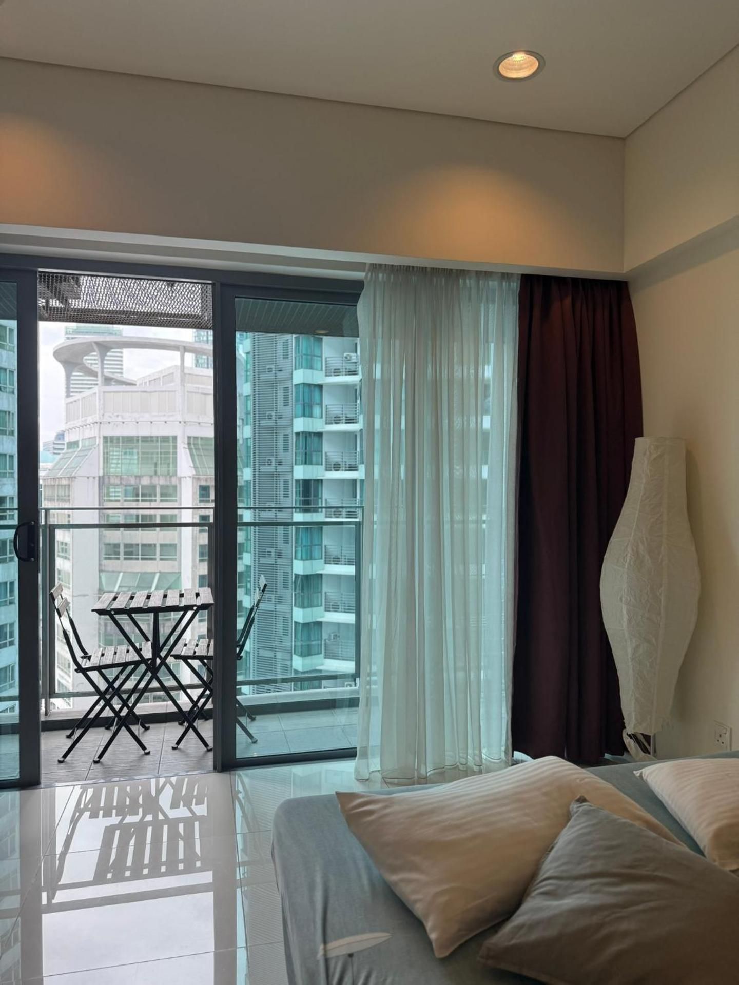 One-Bedroom Apartment with Balcony and City View