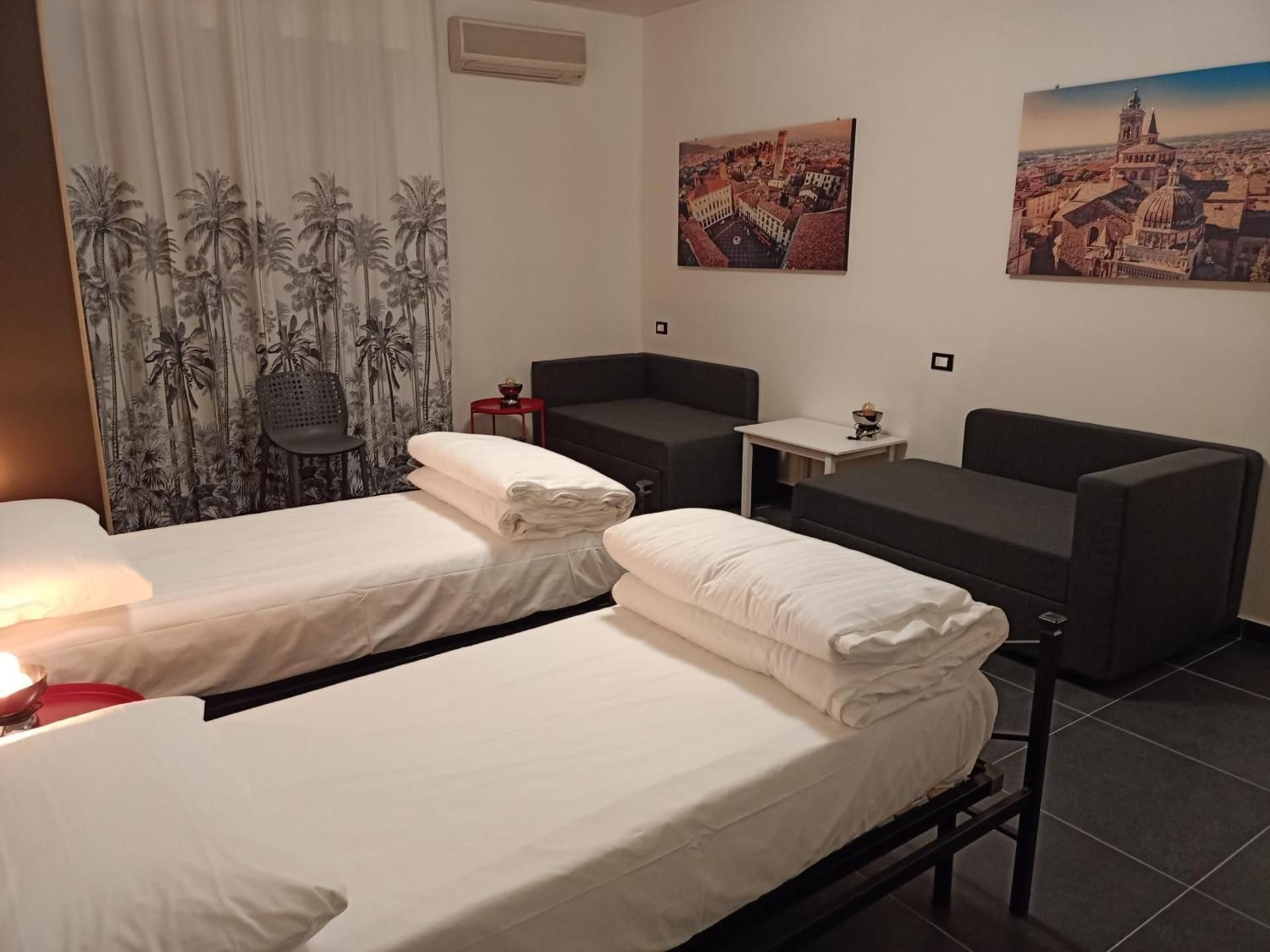 Quadruple Room with Private Bathroom