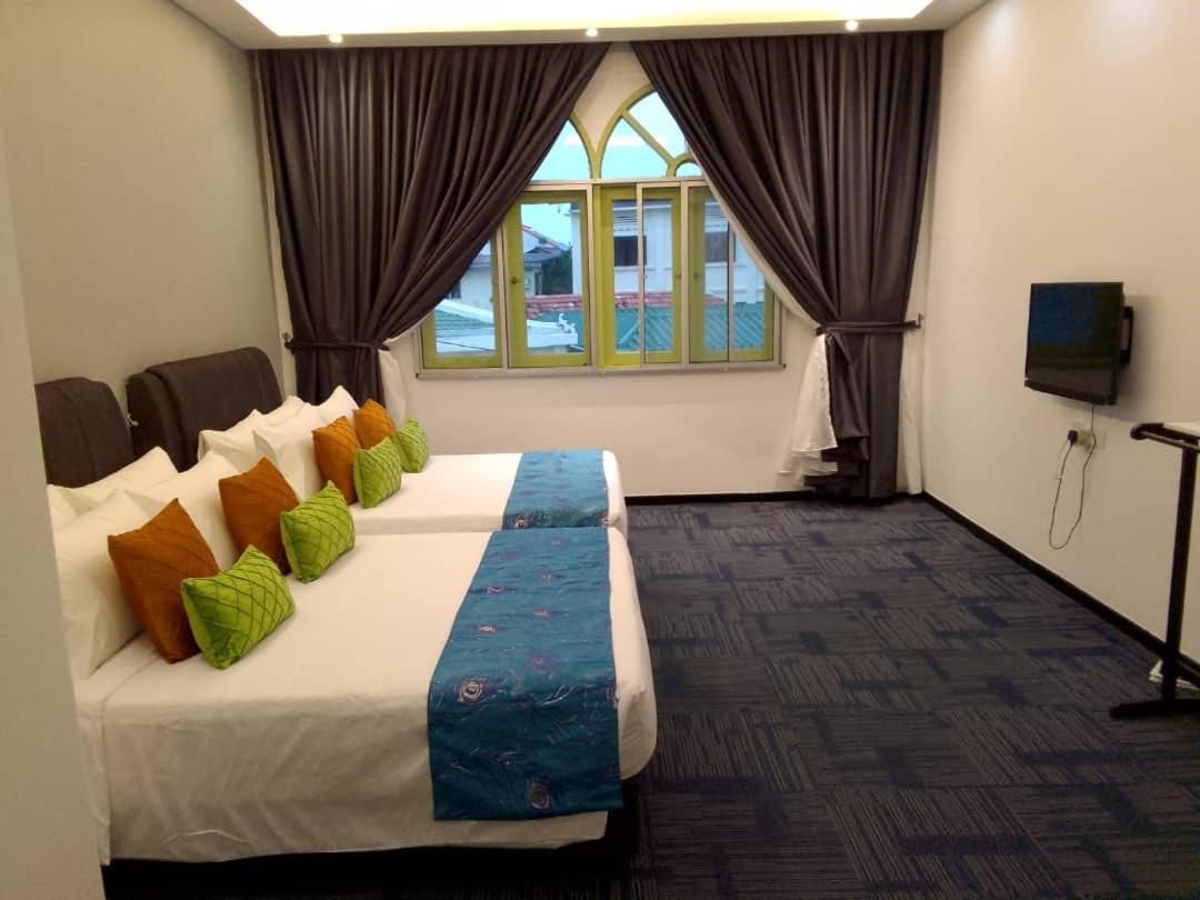 Quadruple Room with Private Bathroom