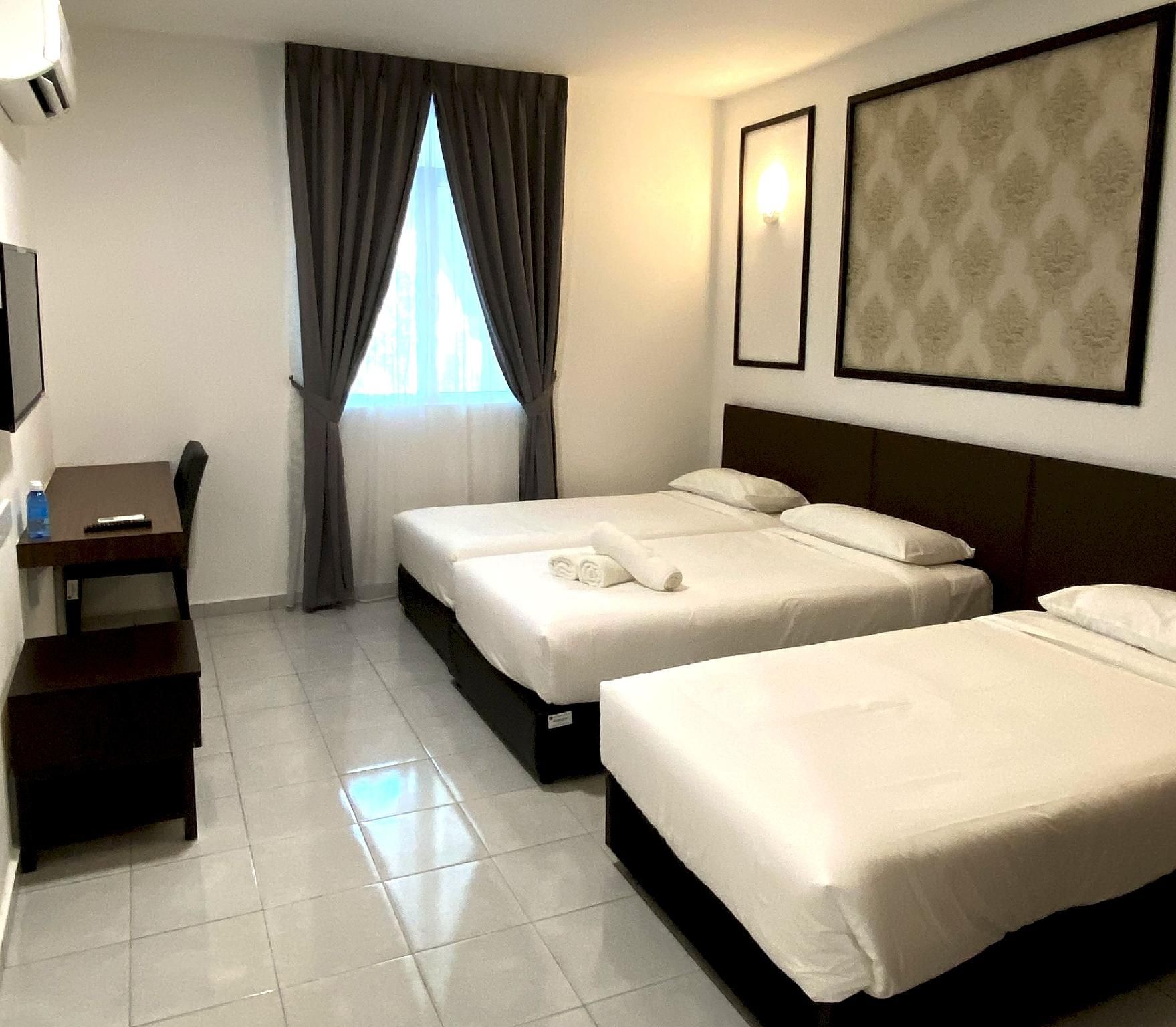 Deluxe Triple Room