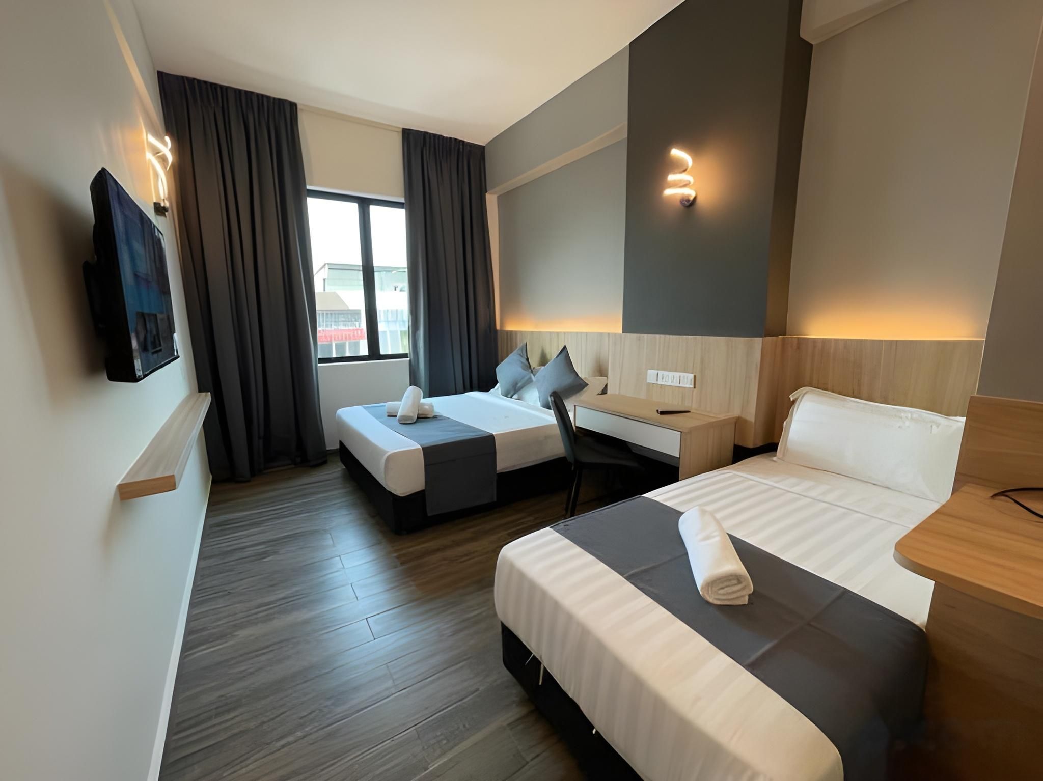 DJ Citi Plaza Hotel & Suites Deluxe Triple Room