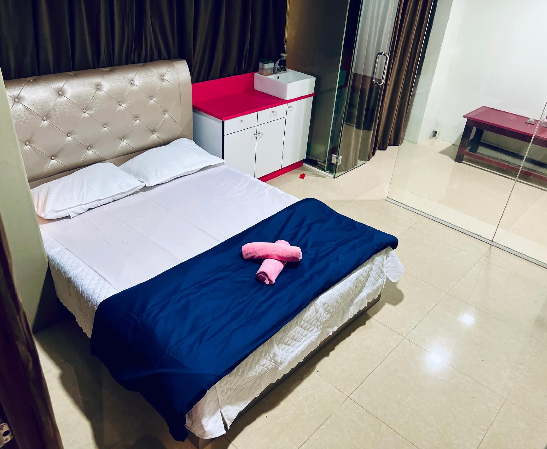 Queen Bedroom with Shared Bathroom