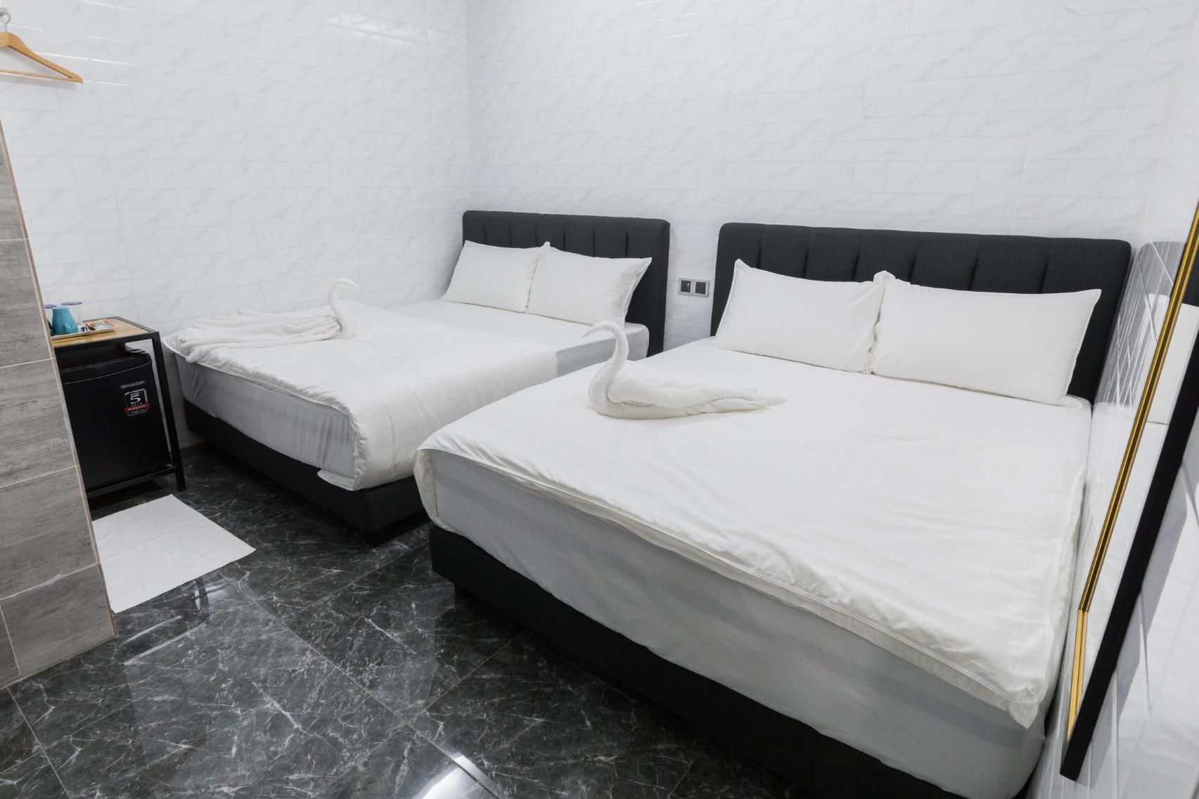 Deluxe Quad Room