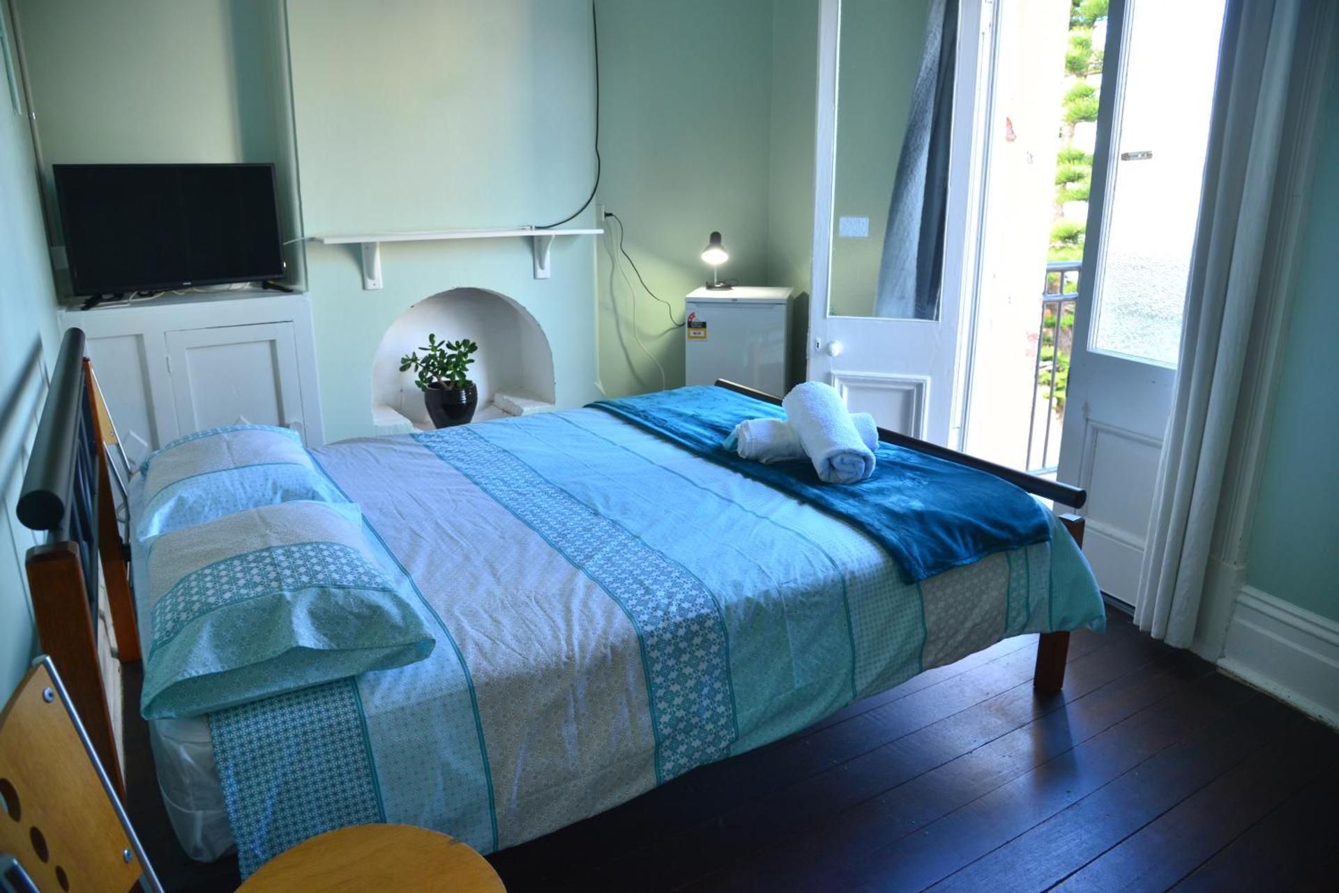 Queen Room with Shared Bathroom