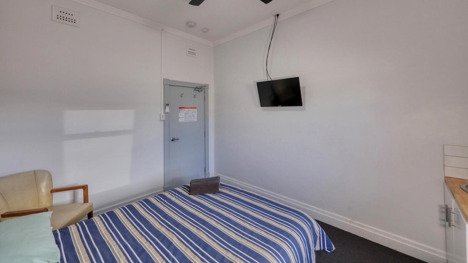 Queen Room with Shared Bathroom