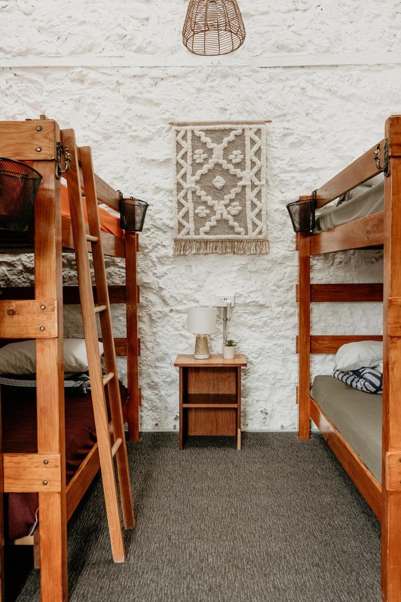 Bed in 8-Bed Female Dormitory Room with Shared Bathroom