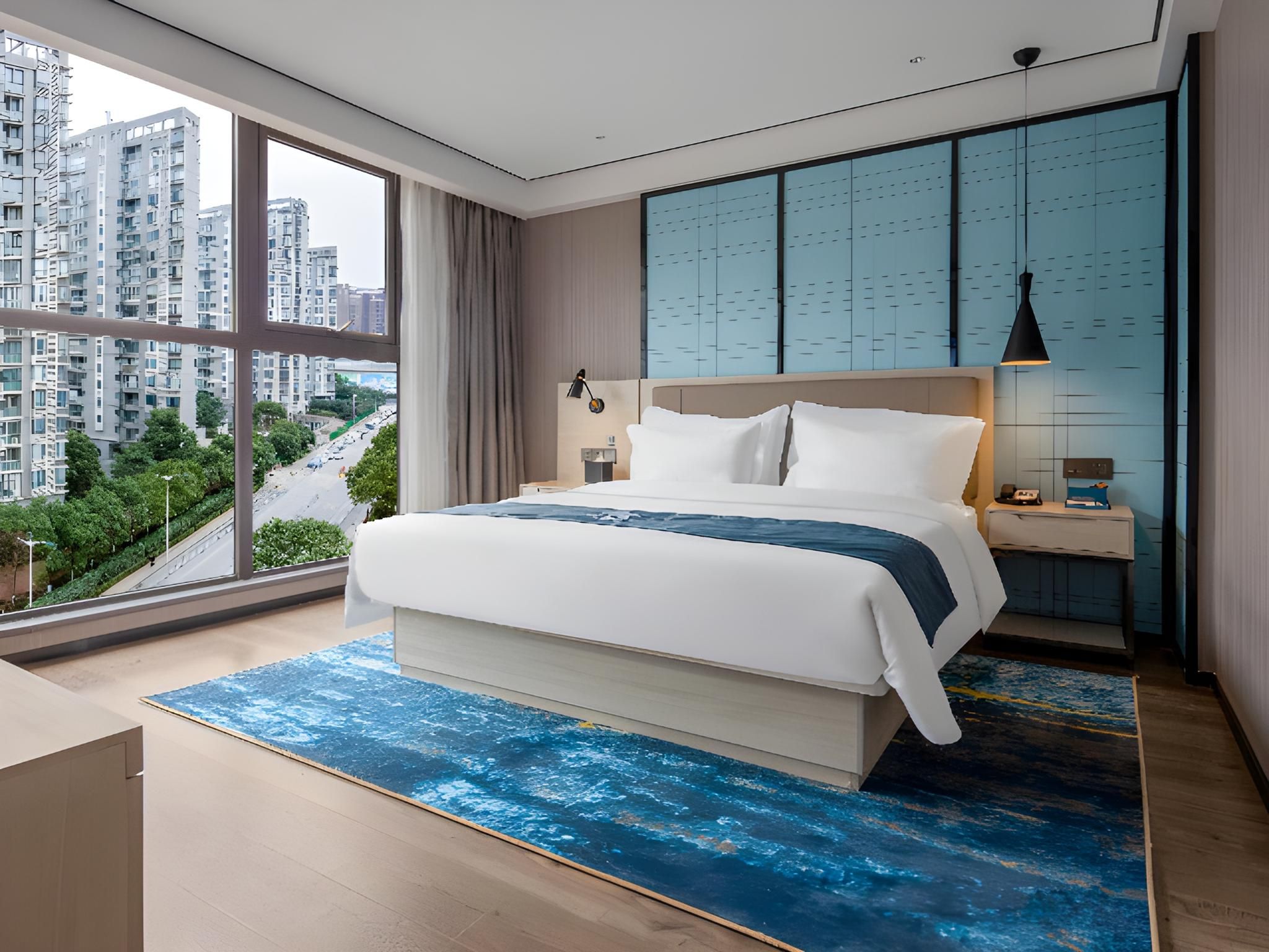 Dossen - Bed Room With City View